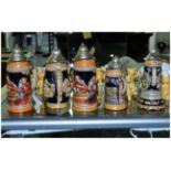 Collection of Five German Stein Tankards, various sizes. Including one musical.