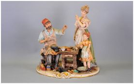 Capo-Di-Monte Early and Signed Group Figure ' Cobbler and Family ' Signed Cortese. Stands 10.25