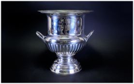 A Modern Silver Plated Two Handle Wine Cooler. Stands 9.75 Inches High, Diameter 8.75 Inches.