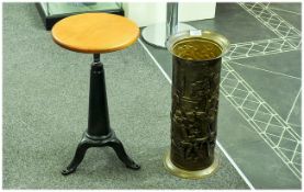 Iron Based Clogger's Stool with Round Wood Revolving Seat, with a Brass Embossed Stick Stand.