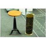 Iron Based Clogger's Stool with Round Wood Revolving Seat, with a Brass Embossed Stick Stand.