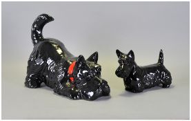 Small Beswick Black Scottie Dog together with a large reclining Scottie Dog