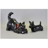 Small Beswick Black Scottie Dog together with a large reclining Scottie Dog