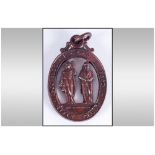 NRA Rifle Clubs Bronze Finish Medallion. Oval with 2 Figures of Different periods between the