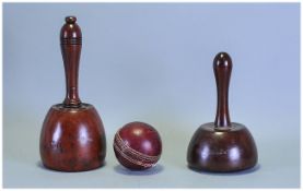 Two Antique Mahogany Mallets. together with a vintage leather cricket ball