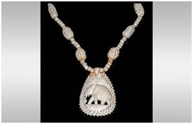 Early To Mid 20thC Carved Bone Elephant Pendant & Necklace Together With One Other Shorter Carved