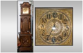 Modern Brown Faced Grandfather Clock probably Austrian or German with a brass square face. Glazed