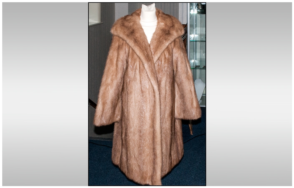 Ladies Three Quarter Length Honey Blonde Mink Coat. Fully lined, slit pockets. Hook & loop