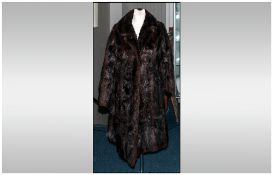 Ladies Three Quarter Length Dark Brown Musquash Coat, fully lined. Collar with revers, Cuff sleeves.
