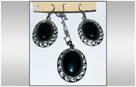 Black Agate Pendant and Earrings Set, an oval cabochon black agate, 1.25 inches high, set in a