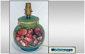 Moorcroft  'Clematis' Pattern Lamp Base on green ground, globe shape; 9 inches high; excellent