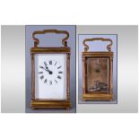English Key Wind 1920's Brass Carriage Clock With 8 Day Visible Escapement, white dial, black