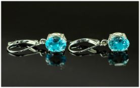 Pair of Sky Blue Topaz Lever Back Earrings, oval cut solitaire blue topaz, each of 2.25cts,