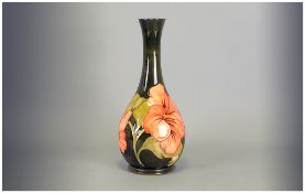 Moorcroft Tall Vase ' Coral Hibiscus ' Design on Emerald Green Ground. Impressed Moorcroft Marks