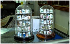Collection of Thimbles together with two display cases and glass domes. Thimbles comprise History of