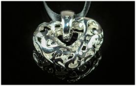 Silver Fashion Pendant, Heart Shaped Pierced Form Set With CZ Stones Suspended On A Black Ribbon