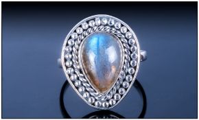 Hand Made Labradorite Ring, a pear cut cabochon of over 4cts, mounted in a silver bezel setting