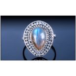 Hand Made Labradorite Ring, a pear cut cabochon of over 4cts, mounted in a silver bezel setting