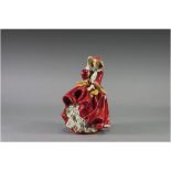 Royal Doulton Figure ' Top Of The Hill ' Style one. HN.1834. Issued 1937, Designer L. Harradine.