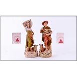 Royal Dux Pair Of Figures ''Shepherd'' And ''Water Carrier'' Circa 1900. Pink triangle to base.