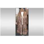 Full Length Blonde Mink Coat, fully lined. Label to inside reads 'Continental Furs of Church St