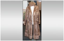 Full Length Blonde Mink Coat, fully lined. Label to inside reads 'Continental Furs of Church St