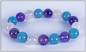 Amethyst, Rose Quartz and Pale Blue Quartzite Bracelet, round beads of the gemstones threaded onto
