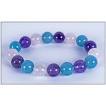 Amethyst, Rose Quartz and Pale Blue Quartzite Bracelet, round beads of the gemstones threaded onto