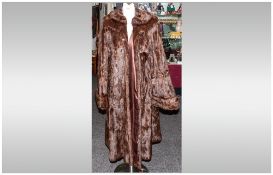 Ladies Three Quarter Length Squirrel Dark Brown Coat fully lined. Hook & Loop Fastenings. Cuff