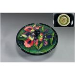 William Moorcroft Impressive Lidded Bowl ' Orchids ' Design on Emerald Green Ground. Label to Base