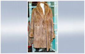 Ladies Three Quarter Length Musquash Jacket. fully lined. Label inside reads 'Ronald Tye Furrier,