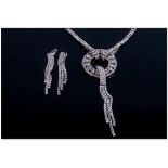 White Crystal Necklace and Earrings Set, the necklace comprising a 'circle of life' pendant with a