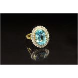 9ct Gold Diamond Dress Ring, Set With A Central Blue Topaz Surrounded By Diamond Chips, Fully
