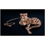 An English 9ct Gold Figural Brooch, In The Form of a Leopard, Set with Diamonds, Sapphires and