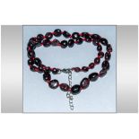 Red Garnet Bead Necklace, polished, ovoid, Indian red garnets, knotted onto red silk and fastened