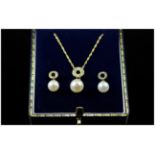 Silver Gilt Faux Pearl Earrings & Pendant Set, With Circular CZ Settings.  The Pendant Suspended
