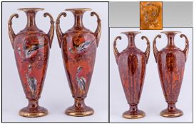 Pair of Forester Phoenix Ware Tall Ovoid Vases, each showing a scene with two hand finished