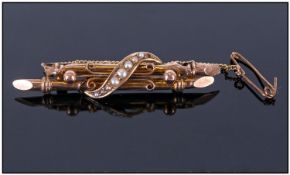 9ct Gold Bar Brooch. Set with small seed pearls. 9ct tab.