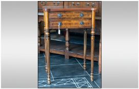A Reproduction Burr Walnut Inlaid Side Table with two drawers on round reeded legs. 30 inches high