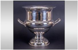 A Modern Silver Plated Large Two Handle Ice Bucket, of shaped and plain form. Stands 9.5 inches.