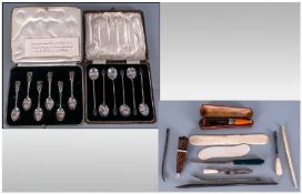 Miscellaneous Lot of Collectables comprising two cased sets of silver coffee spoons,  dated for