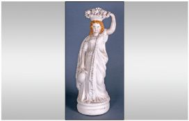 Parion Ware Figure of a Maiden holding a basket of fruit on her head and holding a water carrier. 13