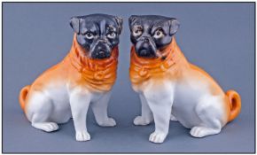 Pair of Continental Pug Dog Figures 7.5 inches in height.