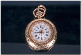 Ladies 14ct Gold Pocket Watch. The case is fully Engraved, with a Floral Pattern. The Dial is Gold