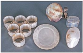 A Small Collection of Mother of Pearl Items including napkin rings, shell, trinket, small dish