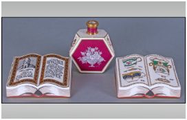 Two Spode 'Book' Paperweights plus a Minton hexagonal perfume bottle, one of the paperweights is the