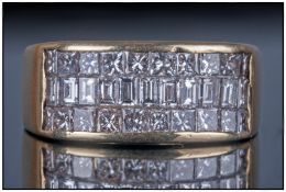 18ct Gold 3 Channel Set Diamond Ring. Consisting of Princess Cut and Baguette Cut Diamonds- Est