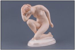 Royal Dux Art Deco Figurine. Nude girl in kneeling position. Circa 1930's. Height 6 inches.