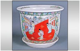 Modern Chinese Ceramic Jardiniere and base. Decorated with Figures ina Japanese Garden Setting. 10.5