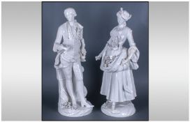 Pair of German Glazed White Figures of a Man and Women in the Classical 18th Century Dress. Possibly
